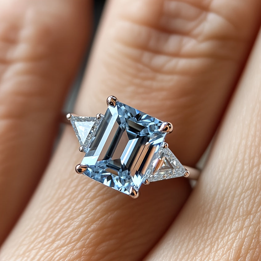 Custom Emerald-Cut Blue Topaz Three-Stone Engagement Ring